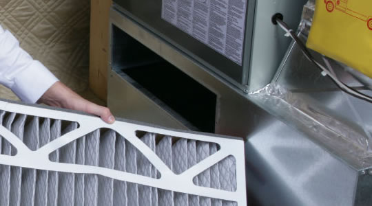 heater-maintenance HVAC technician repairing air conditioner Allen Park MI home