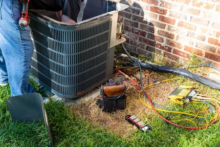 Affordable Comfort Heating and Cooling truck parked at home site